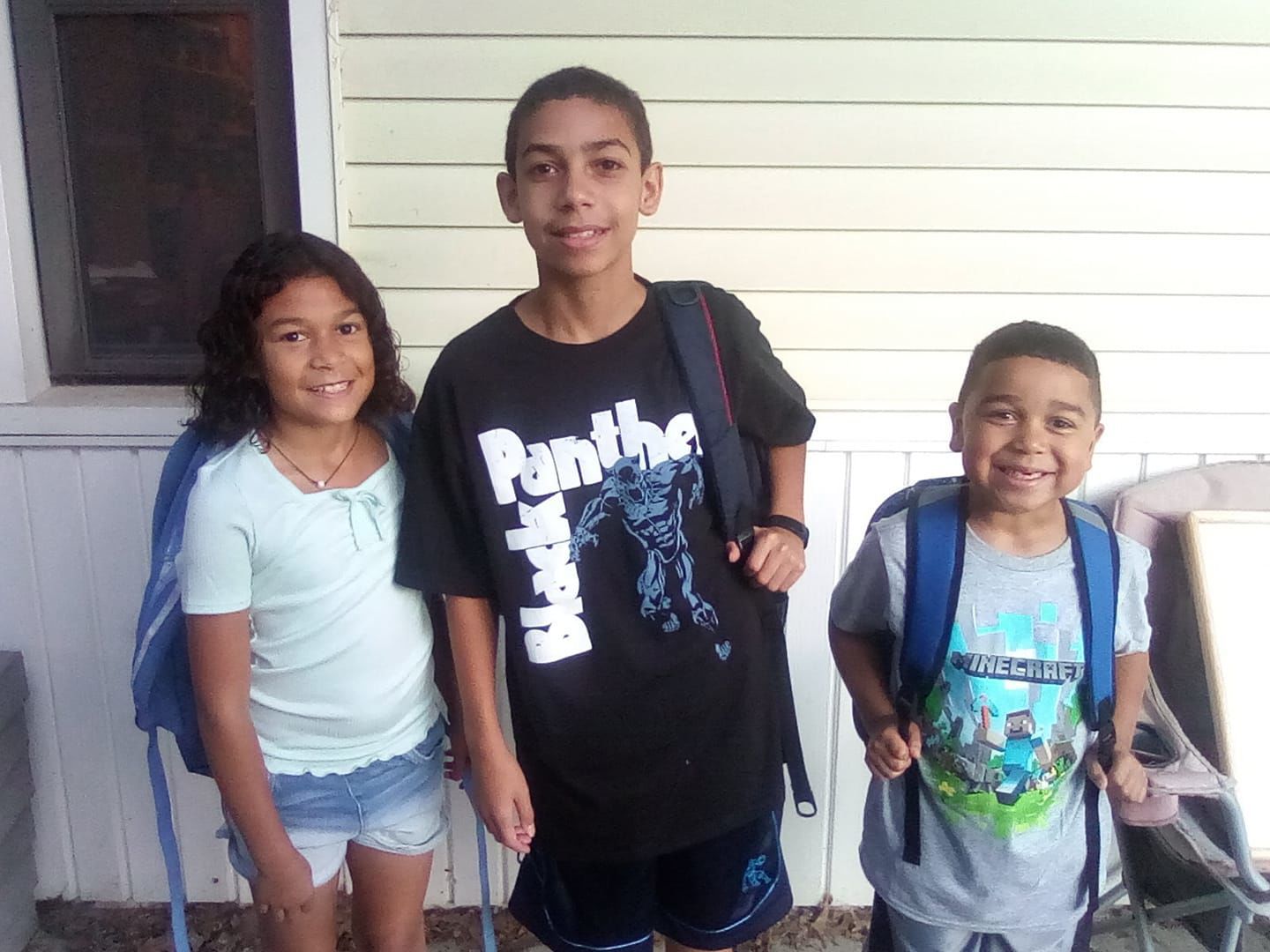 L to R 4th grade at Arnold Elm, 7th grade at Schoo Middle School, 1st grade at Arnold Elm.jpg